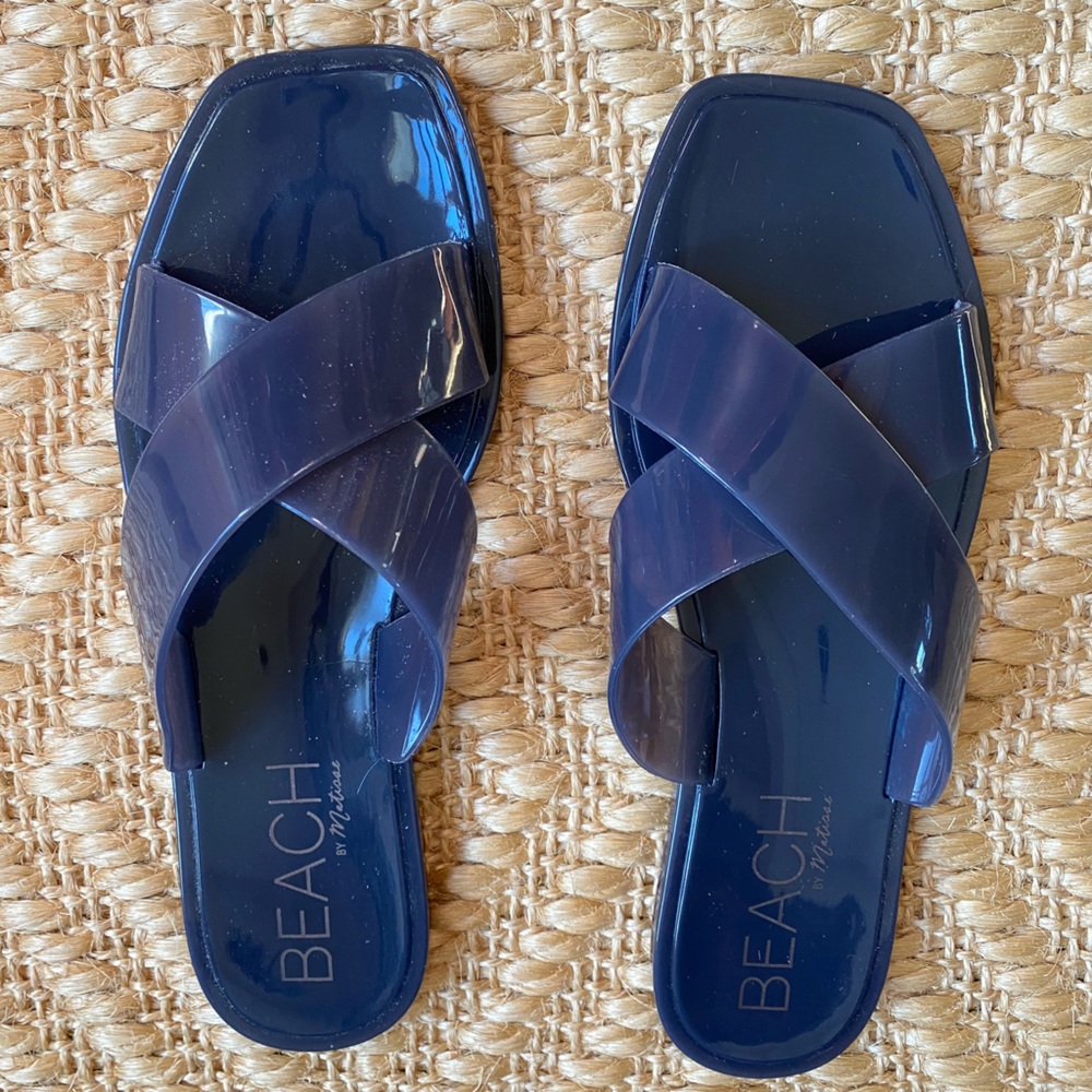 RARELY WORN JELLY SLIDES